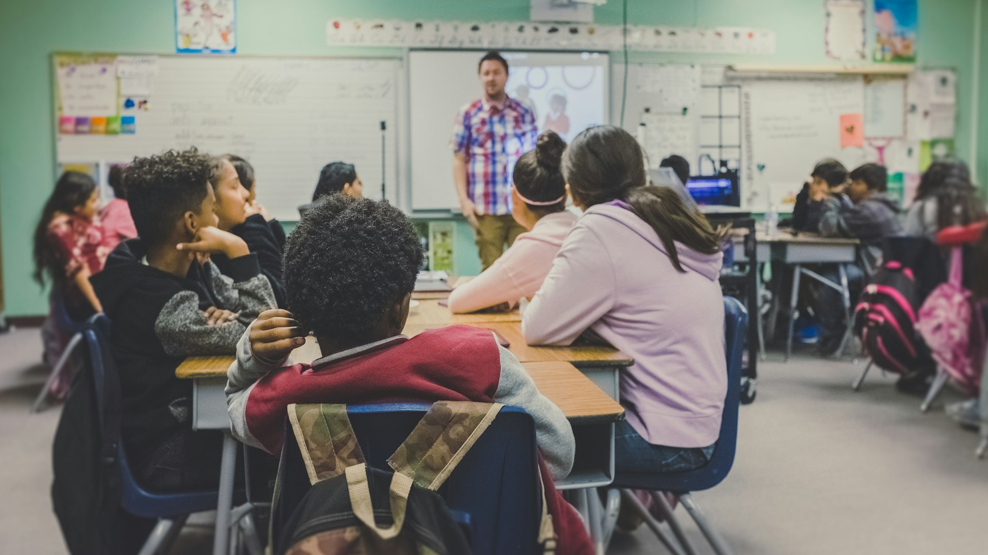 Modern classroom with students and teacher